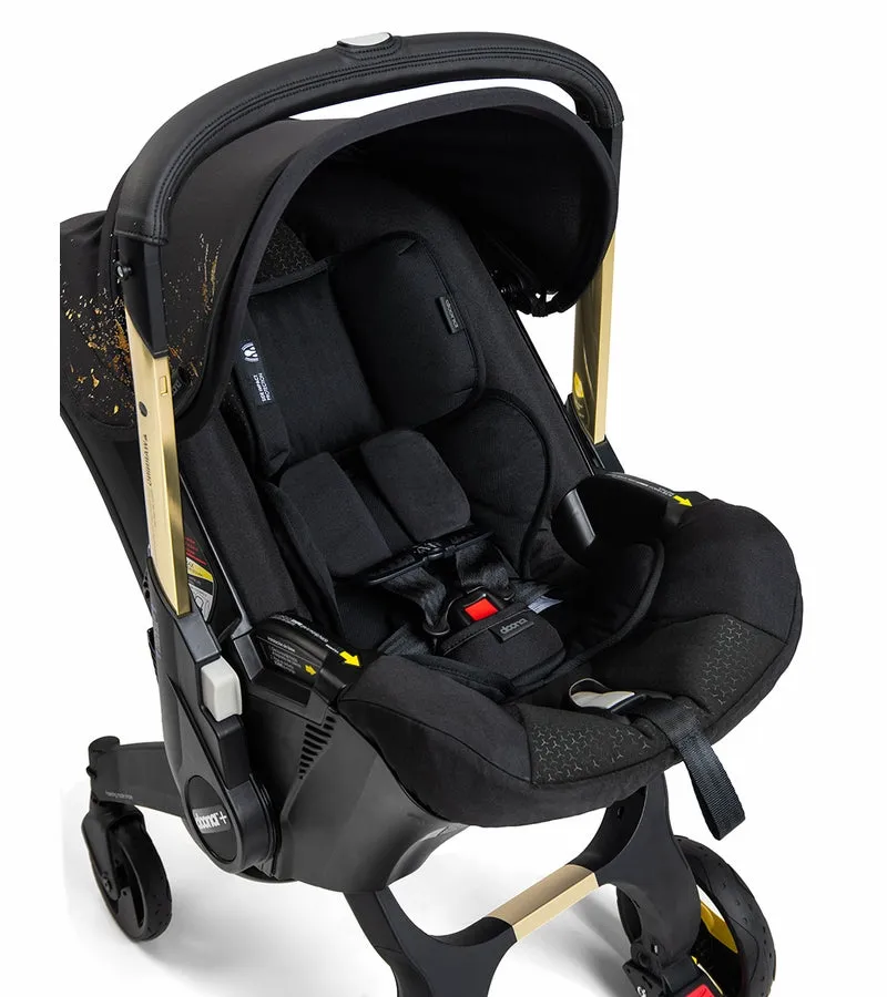 Doona Infant Doona Car Seat & Stroller - Limited Edition Gold